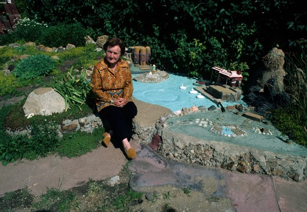 Florence Deeble sits in her rock garden in Lucas, Kansas